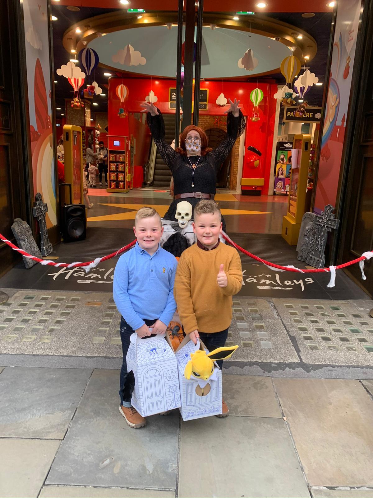 Lucas and Noah outside Hamley’s toy shop on the day of filming with teddies they made in the boxes 