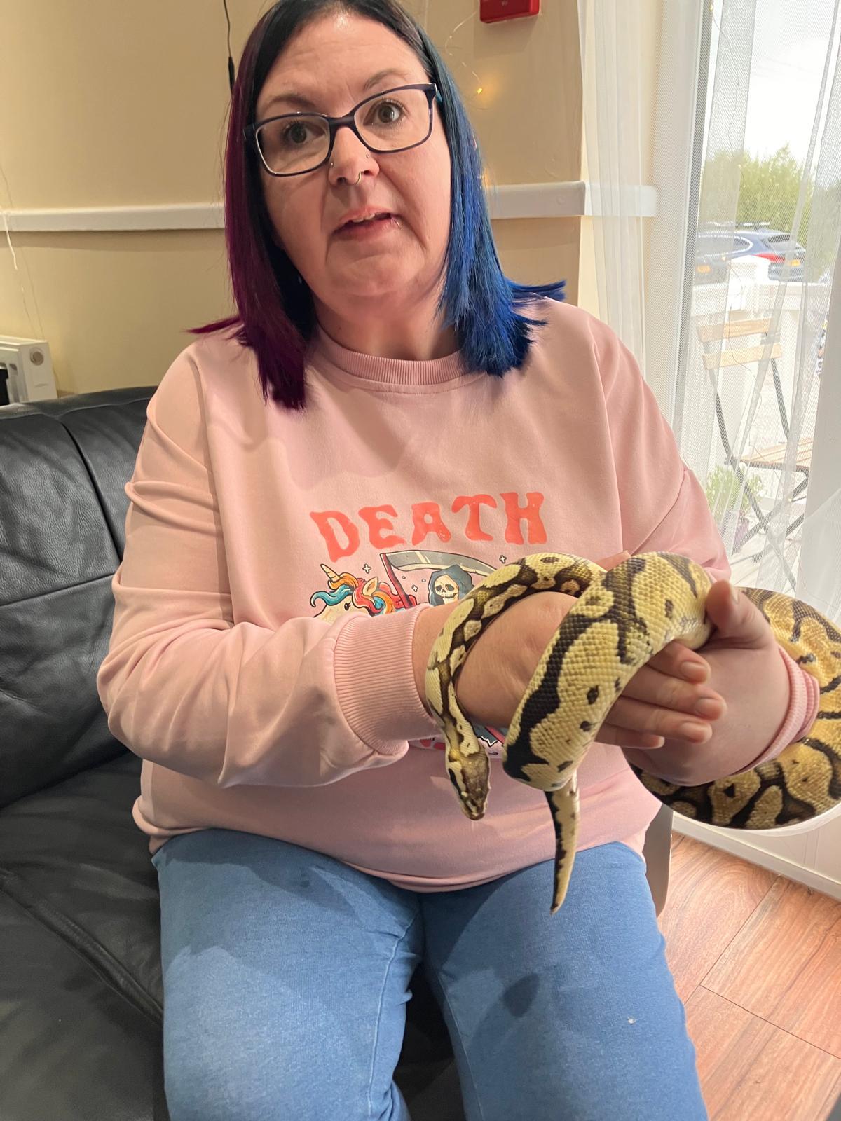 Lynne Stevens with a python.