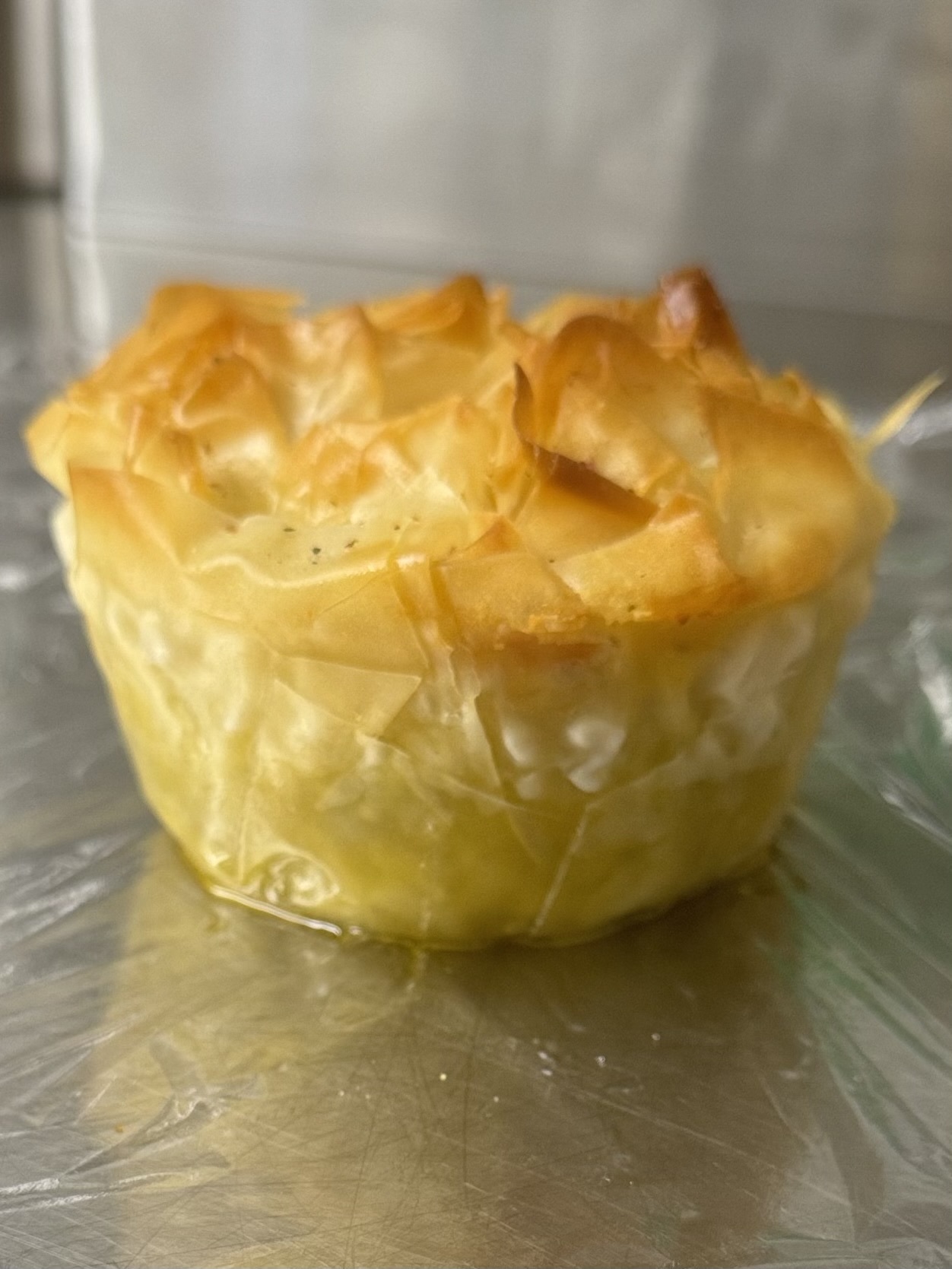 In-house made salmon and tenderstem broccoli filo pie.